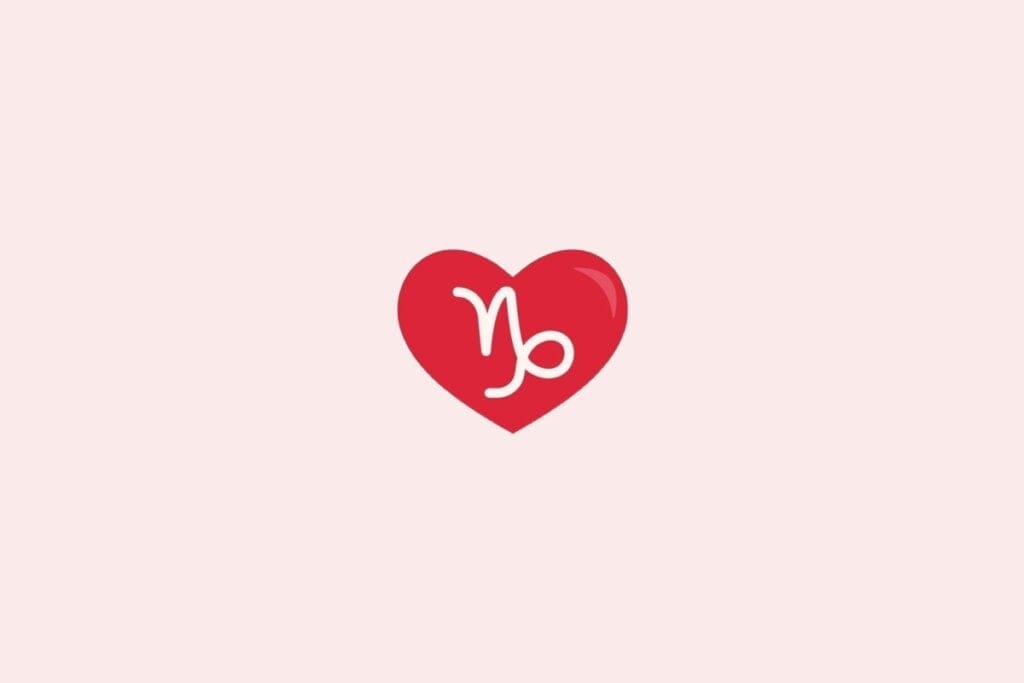 Ilustração do signo de capricórnio em um coração vermelho sobre um fundo rosa-claro