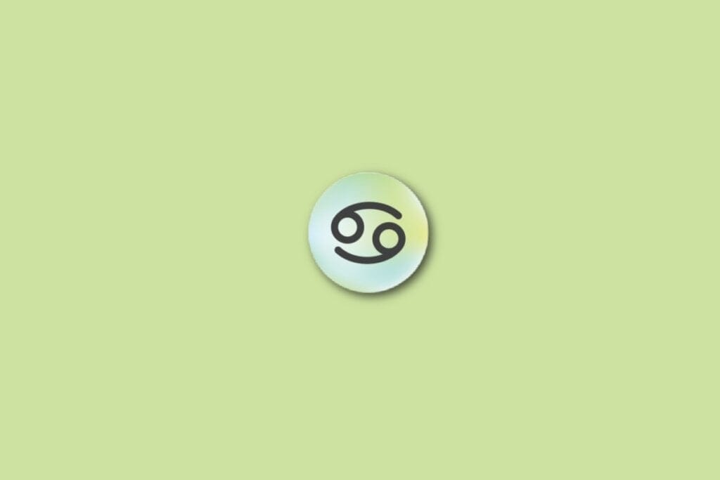 Ilustração do signo de câncer, em um círculo com as cores verde, azul e amarelo, sobre um fundo verde