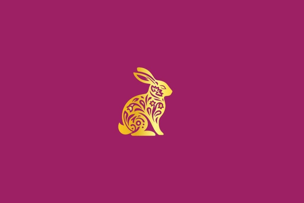 Ilustração de um coelho dourado em um fundo rosa-escuro