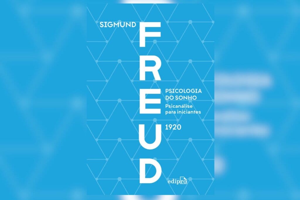Capa do livro A psicologia do sonho com fundo azul e desenhos de triângulos brancos 
