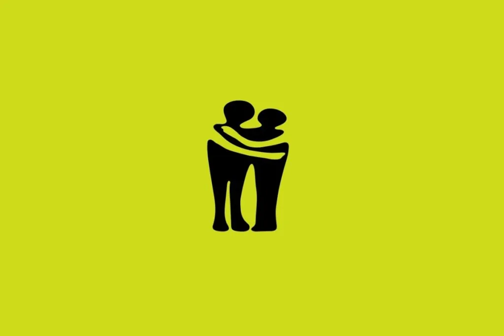 Ilustração do signo de Gêmeos com duas figuras humanas abraçadas em um fundo mostarda