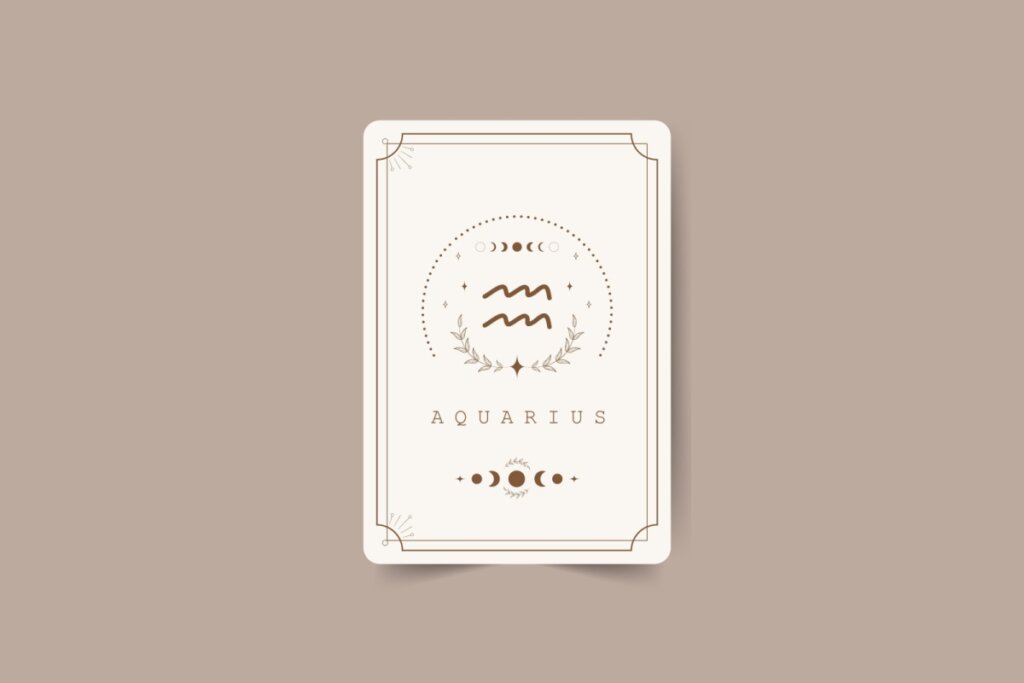 ilustração de uma carta branca com símbolo do signo de aquário marrom com pontos em volta, nome do signo em inglês embaixo e desenhos de lua. carta está em fundo marrom-claro