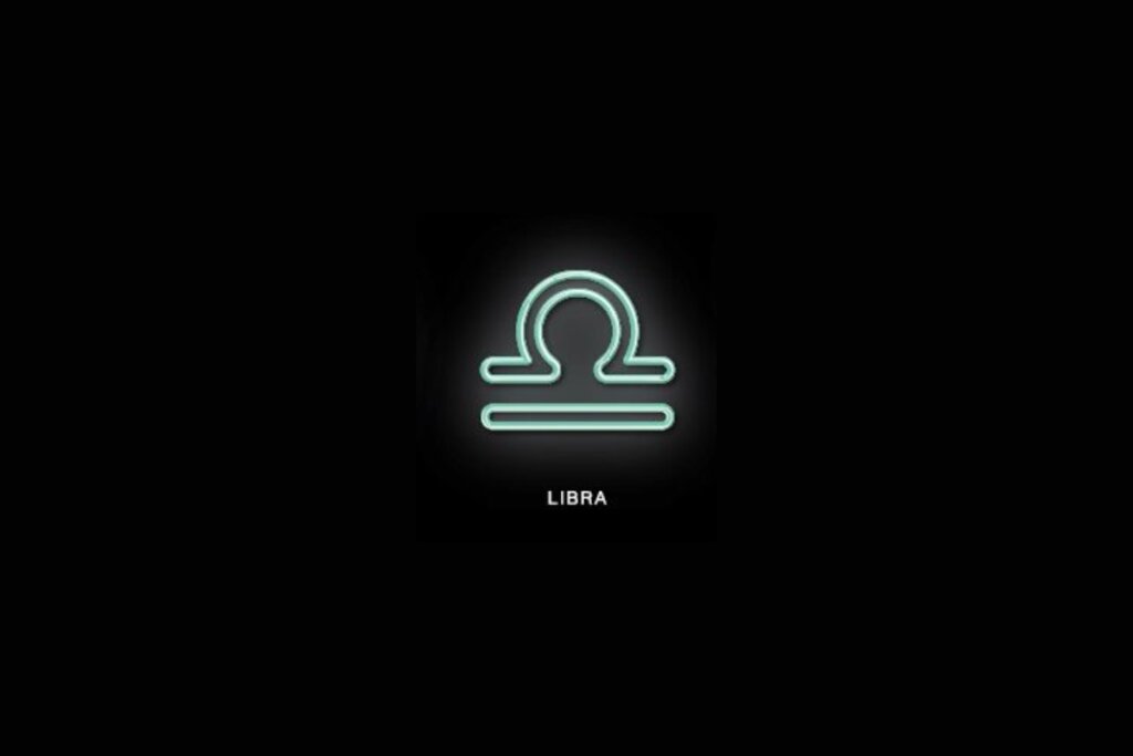 Ilustração azul do símbolo de libra em fundo preto sobre o nome branco do signo