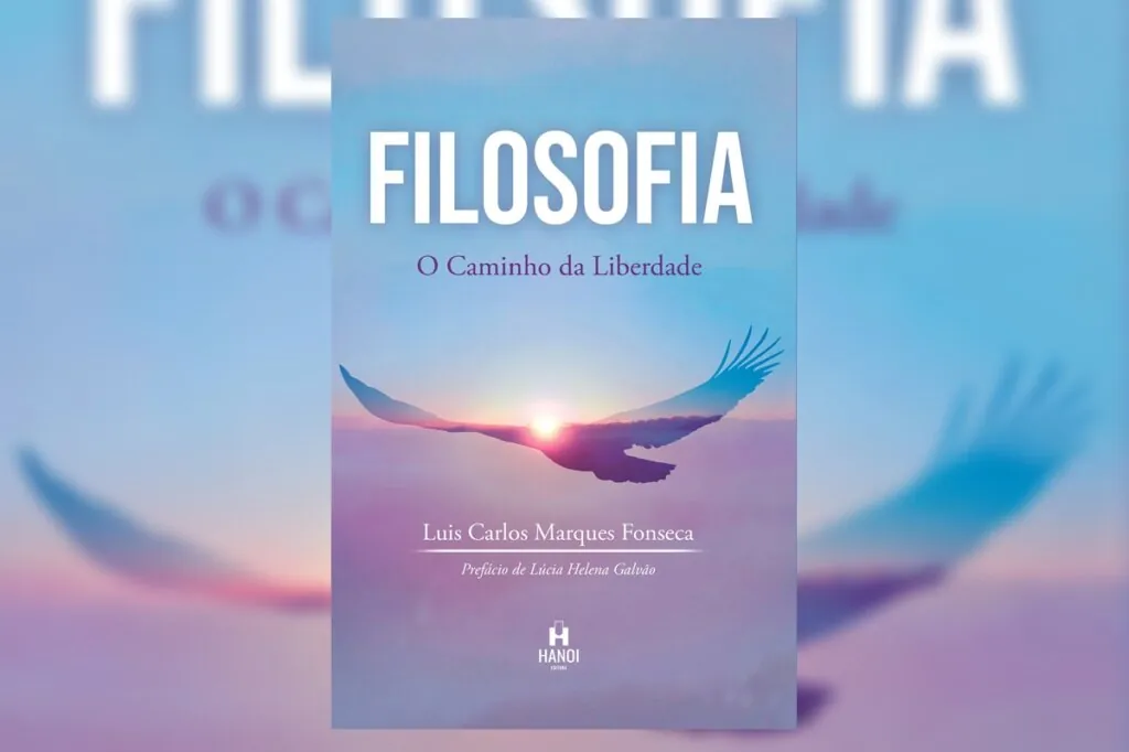 Capa do livro " Filosofia - O caminho da liberdade", com a foto de um pássaro voando ao pôr do sol