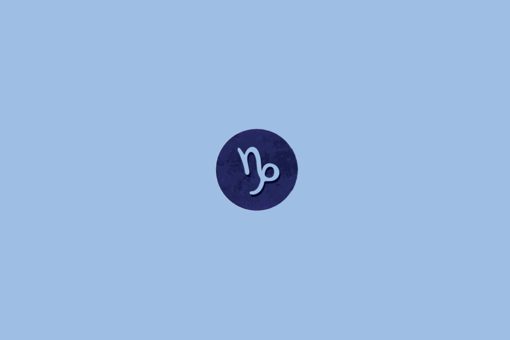 Círculo azul-escuro centralizado em fundo azul-claro. Dentro, o símbolo do signo de capricórnio e manchas escuras ao redor