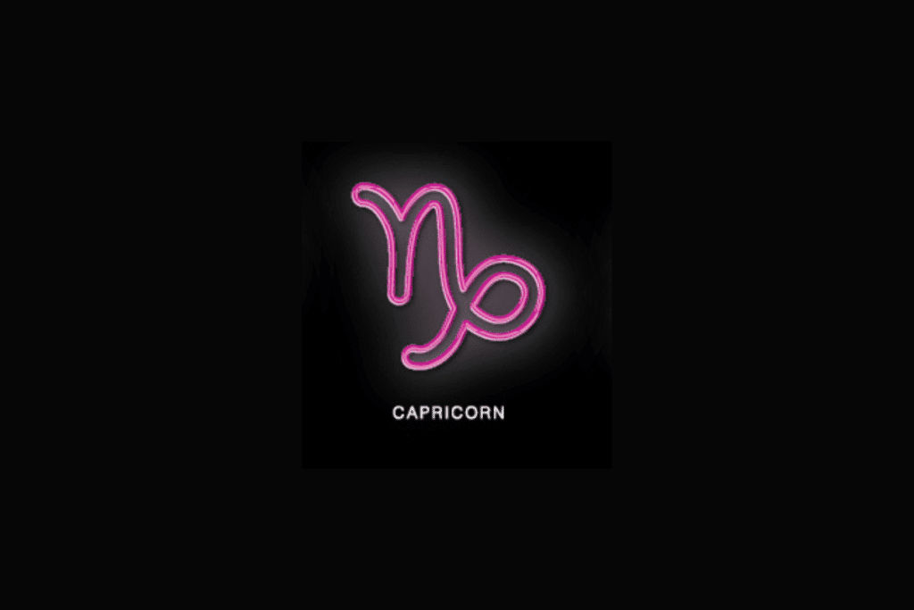 Sobre um fundo preto, o símbolo do signo de Capricórnio é exibido em estilo néon cor-de-rosa brilhante, acompanhado pela palavra "CAPRICORN" escrita em letras maiúsculas brancas na parte inferior
