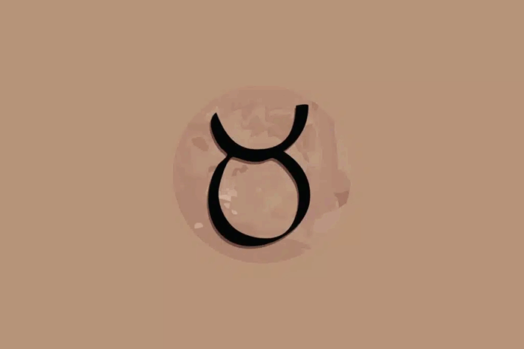 Imagem com fundo bege, apresentando um círculo em tom rosado no centro, com textura que lembra a superfície da Lua. Dentro dele, aparece o símbolo astrológico do signo de Touro em preto, formado por um círculo com duas linhas curvas na parte superior, semelhantes aos chifres de um touro.